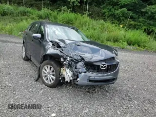 2015 Mazda CX-5 Sport with VIN JM3KE4BYXF0511249, listed as a Copart auction lot 63310695 with 208,615 mi miles and Salvage title. Bid and sale history available at DreamBid. Image 14.