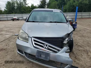 2007 Honda Odyssey EX-L z VIN 5FNRL38657B011922, wystawiony jako Copart lot #56147975 z przebiegiem 149 451 mil mil oraz Szkoda całkowita • Salvage title. Historia ofert i sprzedaży dostępna na DreamBid. Obrazek 5.