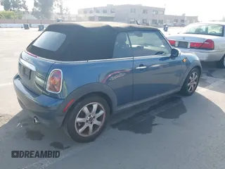 2010 MINI Convertible with VIN WMWMR3C56ATU98301, listed as a IAAI auction lot 42228835 with 117,325 mi miles and . Bid and sale history available at DreamBid. Image 4.