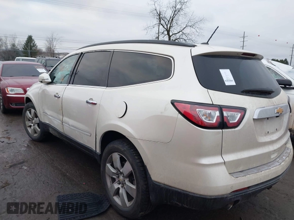 2014 Chevrolet Traverse LTZ z VIN 1GNKRJKDXEJ263349, wystawiony jako IAAI lot #41180521 z przebiegiem 141 564 mil mil oraz . Historia ofert i sprzedaży dostępna na DreamBid. Obrazek 3.