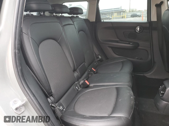 2017 MINI Countryman Cooper with VIN WMZYS7C31H3E06457, listed as a Copart auction lot 49351315 with 77,461 mi miles and Salvage title. Bid and sale history available at DreamBid. Image 11.
