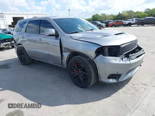 2018 Dodge Durango SRT with VIN 1C4SDJGJ6JC366644, listed as a IAAI auction lot 41906182 with 54,490 mi miles and . Bid and sale history available at carsss.com. Image 1.