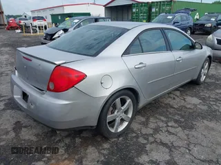 2006 Pontiac G6 GTP z VIN 1G2ZM551864235844, wystawiony jako IAAI lot #42088507 z przebiegiem 170 376 mil mil oraz . Historia ofert i sprzedaży dostępna na DreamBid. Obrazek 4.