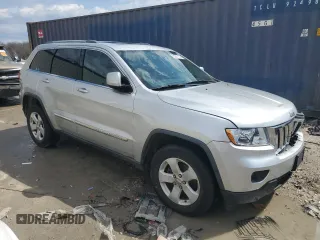 2011 Jeep Grand Cherokee 70th Anniversary with VIN 1J4RR4GG5BC731297, listed as a Copart auction lot 53297135 with 233,392 mi miles and Non Repairable. Bid and sale history available at carsss.com. Image 4.