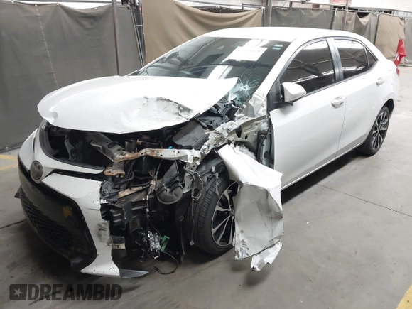 2017 Toyota Corolla L with VIN 5YFBURHE7HP693037, listed as a IAAI auction lot 42304020 with 117,710 mi miles and . Bid and sale history available at DreamBid. Image 18.