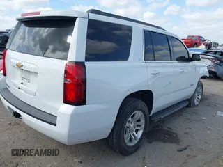 2019 Chevrolet Tahoe LT with VIN 1GNSCBKC3KR160818, listed as a IAAI auction lot 41787468 with 174,691 mi miles and . Bid and sale history available at DreamBid. Image 4.