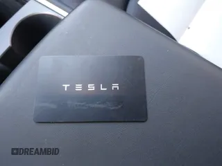 2023 Tesla Model Y Long Range with VIN 7SAYGDEE3PF817097, listed as a IAAI auction lot 41767294 with 64,047 mi miles and . Bid and sale history available at DreamBid. Image 11.