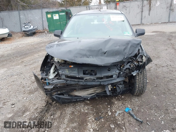 2011 Ford Focus SE with VIN 1FAHP3FN6BW140790, listed as a IAAI auction lot 41277430 with 114,192 mi miles. Bid and sale history available at carsss.com. Image 12.