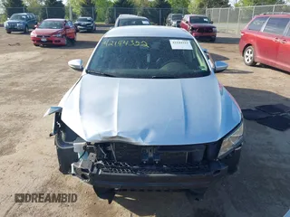 2016 Volkswagen Passat S with VIN 1VWAT7A39GC014305, listed as a IAAI auction lot 42144322 with 187,419 mi miles and . Bid and sale history available at DreamBid. Image 13.