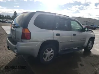 2006 GMC Envoy SLE with VIN 1GKDT13S262327772, listed as a Copart auction lot 85270134 with 242,390 mi miles and Salvage Title. Bid and sale history available at carsss.com. Image 3.