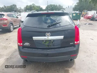 2015 Cadillac SRX Premium Collection with VIN 3GYFNGE30FS634363, listed as a IAAI auction lot 42672064 with 146,821 mi miles and . Bid and sale history available at DreamBid. Image 16.