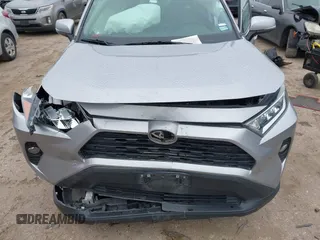 2021 Toyota RAV4 XLE with VIN 2T3W1RFVXMC148125, listed as a IAAI auction lot 41645741 with 66,047 mi miles. Bid and sale history available at carsss.com. Image 6.