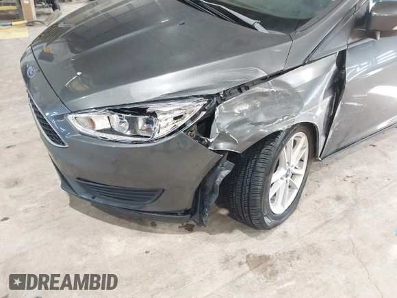 2017 Ford Focus SE with VIN 1FADP3F29HL220440, listed as a IAAI auction lot 41975013 with 40,295 mi miles and . Bid and sale history available at DreamBid. Image 6.