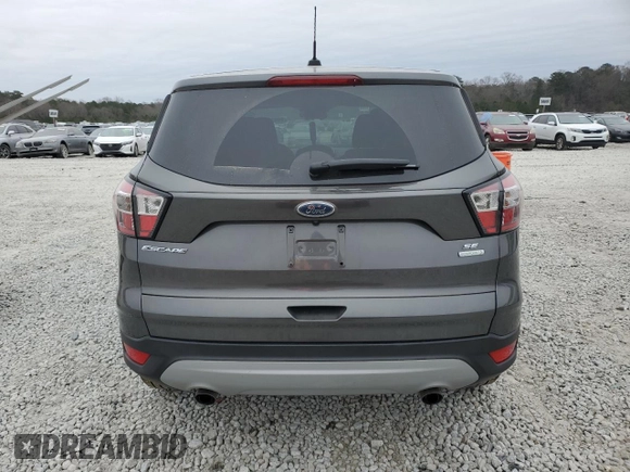 2017 Ford Escape SE with VIN 1FMCU0GD5HUC67421, listed as a Copart auction lot 86633734 with 82,929 mi miles and Salvage Title. Bid and sale history available at DreamBid. Image 6.