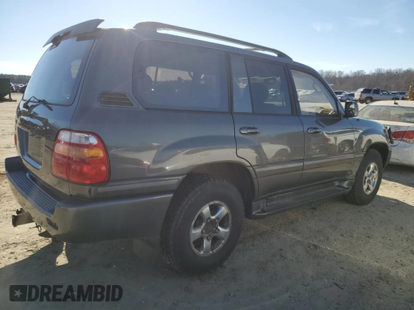2002 Toyota Land Cruiser z VIN JTEHT05J122024015, wystawiony jako Copart lot #88706765 z przebiegiem Nie podano mil oraz Czysty tytuł • Clean title. Historia ofert i sprzedaży dostępna na DreamBid. Obrazek 3.