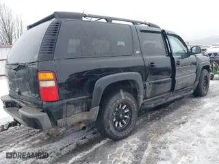 2003 Chevrolet Suburban LT with VIN 3GNFK16Z93G326483, listed as a IAAI auction lot 41615404 with 177,819 mi miles. Bid and sale history available at carsss.com. Image 4.