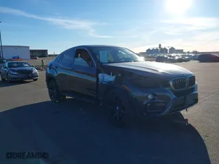 2015 BMW X6 xDrive35i with VIN 5UXKU2C50F0N77926, listed as a IAAI auction lot 41681268 with 136,118 mi miles. Bid and sale history available at carsss.com. Image 6.