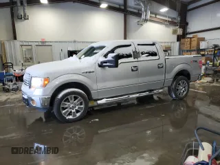2012 Ford F-150 XL with VIN 1FTFW1ET4CFB18992, listed as a Copart auction lot 88144555 with 189,934 mi miles and Salvage Title. Bid and sale history available at carsss.com. Image 1.