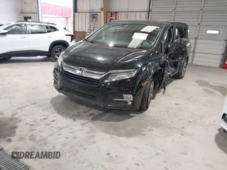 2018 Honda Odyssey Touring with VIN 5FNRL6H87JB105410, listed as a IAAI auction lot 41860707 with 91,908 mi miles. Bid and sale history available at carsss.com. Image 20.