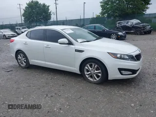 2012 Kia Optima LX z VIN 5XXGM4A71CG032691, wystawiony jako IAAI lot #42280118 z przebiegiem 158 352 mil mil oraz . Historia ofert i sprzedaży dostępna na DreamBid. Obrazek 1.