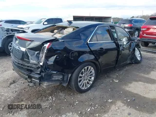 2011 Cadillac CTS Premium with VIN 1G6DP5ED2B0171652, listed as a IAAI auction lot 41229368 with 162,064 mi miles and . Bid and sale history available at DreamBid. Image 4.