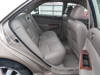 2002 Toyota Camry LE z VIN 4T1BE32K52U086150, wystawiony jako IAAI lot #42126685 z przebiegiem 175 212 mil mil oraz . Historia ofert i sprzedaży dostępna na DreamBid. Obrazek 8.