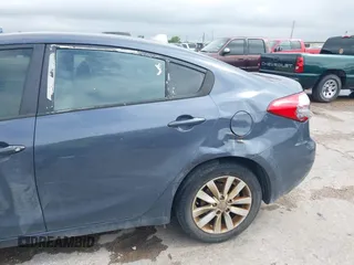 2014 Kia Forte LX with VIN KNAFX4A62E5221011, listed as a IAAI auction lot 42063598 with 187,649 mi miles. Bid and sale history available at carsss.com. Image 6.