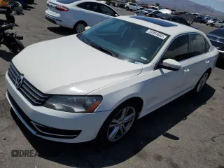 2014 Volkswagen Passat SE z VIN 1VWBT7A34EC061825, wystawiony jako Copart lot #59903665 z przebiegiem 185 542 mil mil oraz Szkoda całkowita • Salvage title. Historia ofert i sprzedaży dostępna na DreamBid. Obrazek 1.