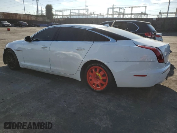 2014 Jaguar XJ with VIN SAJWA2GZ9E8V71794, listed as a Copart auction lot 74347574 with 106,172 mi miles and Clean Title. Bid and sale history available at carsss.com. Image 2.
