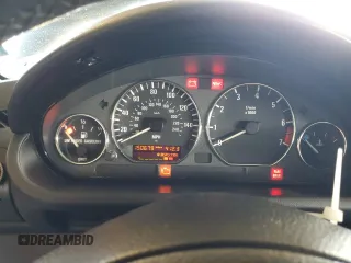 2000 BMW Z3 2.5 with VIN 4USCH9342YLG04259, listed as a Copart auction lot 60921805 with 150,679 mi miles and Salvage title. Bid and sale history available at DreamBid. Image 9.