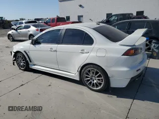 2015 Mitsubishi Lancer Evolution GSR with VIN JA32W8FV4FU024603, listed as a Copart auction lot 74699914 with 81,311 mi miles and Salvage Title. Bid and sale history available at carsss.com. Image 2.