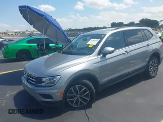 2021 Volkswagen Tiguan S with VIN 3VV1B7AX7MM117954, listed as a IAAI auction lot 42300223 with 45,587 mi miles and . Bid and sale history available at DreamBid. Image 2.