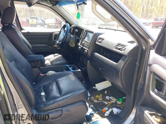 2009 Honda Ridgeline RTL with VIN 2HJYK16539H503533, listed as a IAAI auction lot 42040423 with 206,102 mi miles and . Bid and sale history available at DreamBid. Image 5.