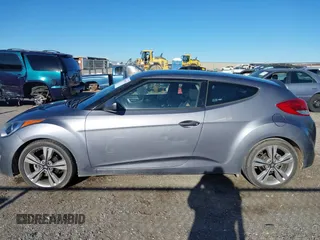 2017 Hyundai Veloster with VIN KMHTC6AD9HU323472, listed as a IAAI auction lot 41865974 with 94,692 mi miles. Bid and sale history available at carsss.com. Image 14.