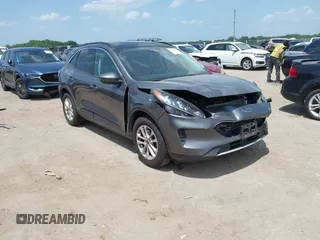 2021 Ford Escape SE z VIN 1FMCU0G66MUB00982, wystawiony jako IAAI lot #42537037 z przebiegiem 50 857 mil mil oraz . Historia ofert i sprzedaży dostępna na DreamBid. Obrazek 1.