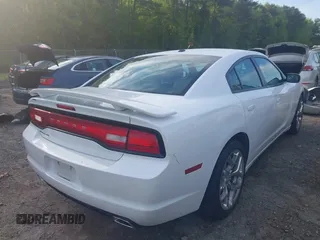 2014 Dodge Charger SXT with VIN 2C3CDXHG4EH337807, listed as a IAAI auction lot 42027319 with 151,988 mi miles. Bid and sale history available at carsss.com. Image 4.