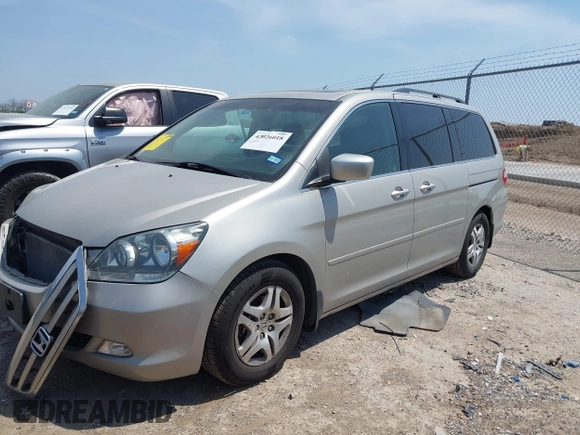 2007 Honda Odyssey EX-L with VIN 5FNRL38757B431334, listed as a IAAI auction lot 42026018 with 135,898 mi miles. Bid and sale history available at carsss.com. Image 2.