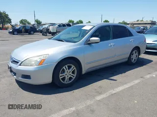2007 Honda Accord LX SE z VIN JHMCM56327C023786, wystawiony jako IAAI lot #42465479 z przebiegiem 141 077 mil mil oraz . Historia ofert i sprzedaży dostępna na DreamBid. Obrazek 2.