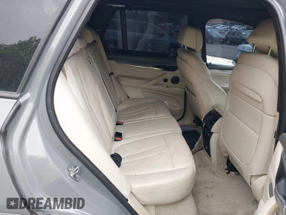 2016 BMW X5 xDrive50i with VIN 5UXKR6C57G0J80370, listed as a IAAI auction lot 42040278 with 99,071 mi miles. Bid and sale history available at carsss.com. Image 8.