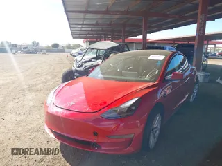2023 Tesla Model 3 with VIN 5YJ3E1EA9PF546264, listed as a IAAI auction lot 41657055 with 5,634 mi miles and . Bid and sale history available at DreamBid. Image 2.