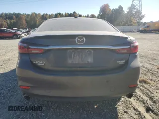 2021 Mazda 6 Signature with VIN JM1GL1XY0M1617051, listed as a Copart auction lot 76715774 with 43,925 mi miles and Salvage Title. Bid and sale history available at DreamBid. Image 6.