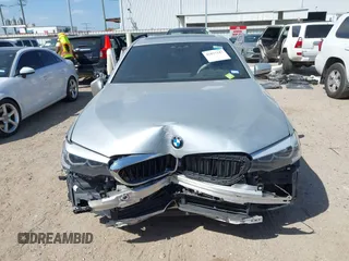 2020 BMW 5 Series 530i with VIN WBAJR3C09LWW65629, listed as a IAAI auction lot 41827147 with 24,324 mi miles and . Bid and sale history available at DreamBid. Image 12.