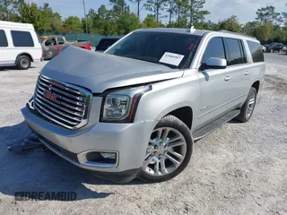 2018 GMC Yukon XL SLT with VIN 1GKS1GKC6JR113510, listed as a IAAI auction lot 42006987 with 161,389 mi miles and . Bid and sale history available at carsss.com. Image 2.
