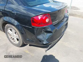 2013 Dodge Avenger SXT with VIN 1C3CDZCB0DN548161, listed as a IAAI auction lot 42780346 with 117,493 mi miles and . Bid and sale history available at DreamBid. Image 13.