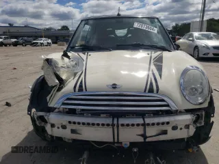 2008 MINI Convertible with VIN WMWRF33518TF67472, listed as a Copart auction lot 72073604 with 61,024 mi miles and Salvage title. Bid and sale history available at DreamBid. Image 5.