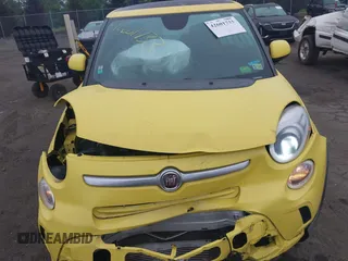 2014 FIAT 500L Trekking z VIN ZFBCFADH1EZ015579, wystawiony jako IAAI lot #42601733 z przebiegiem 185 909 mil mil oraz . Historia ofert i sprzedaży dostępna na DreamBid. Obrazek 13.