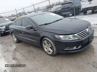 2013 Volkswagen CC Sport with VIN WVWBP7AN2DE506977, listed as a IAAI auction lot 41440929 with 62,385 mi miles. Bid and sale history available at carsss.com. Image 1.