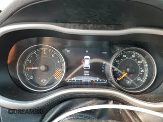 2015 Jeep Cherokee Trailhawk with VIN 1C4PJMBS0FW675807, listed as a Copart auction lot 58800615 with 109,019 mi miles and Salvage title. Bid and sale history available at DreamBid. Image 9.