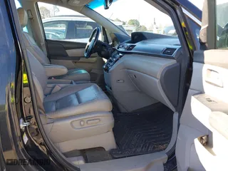2013 Honda Odyssey Touring with VIN 5FNRL5H99DB076385, listed as a IAAI auction lot 41751504 with 233,875 mi miles. Bid and sale history available at carsss.com. Image 5.