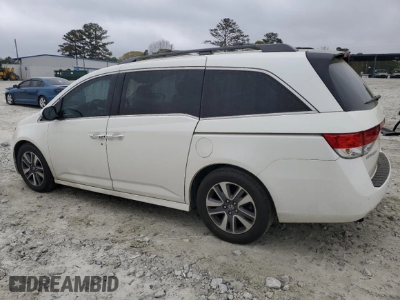 2016 Honda Odyssey Touring Elite with VIN 5FNRL5H91GB038752, listed as a Copart auction lot 50680985 with 81,576 mi miles and Salvage Title. Bid and sale history available at carsss.com. Image 2.